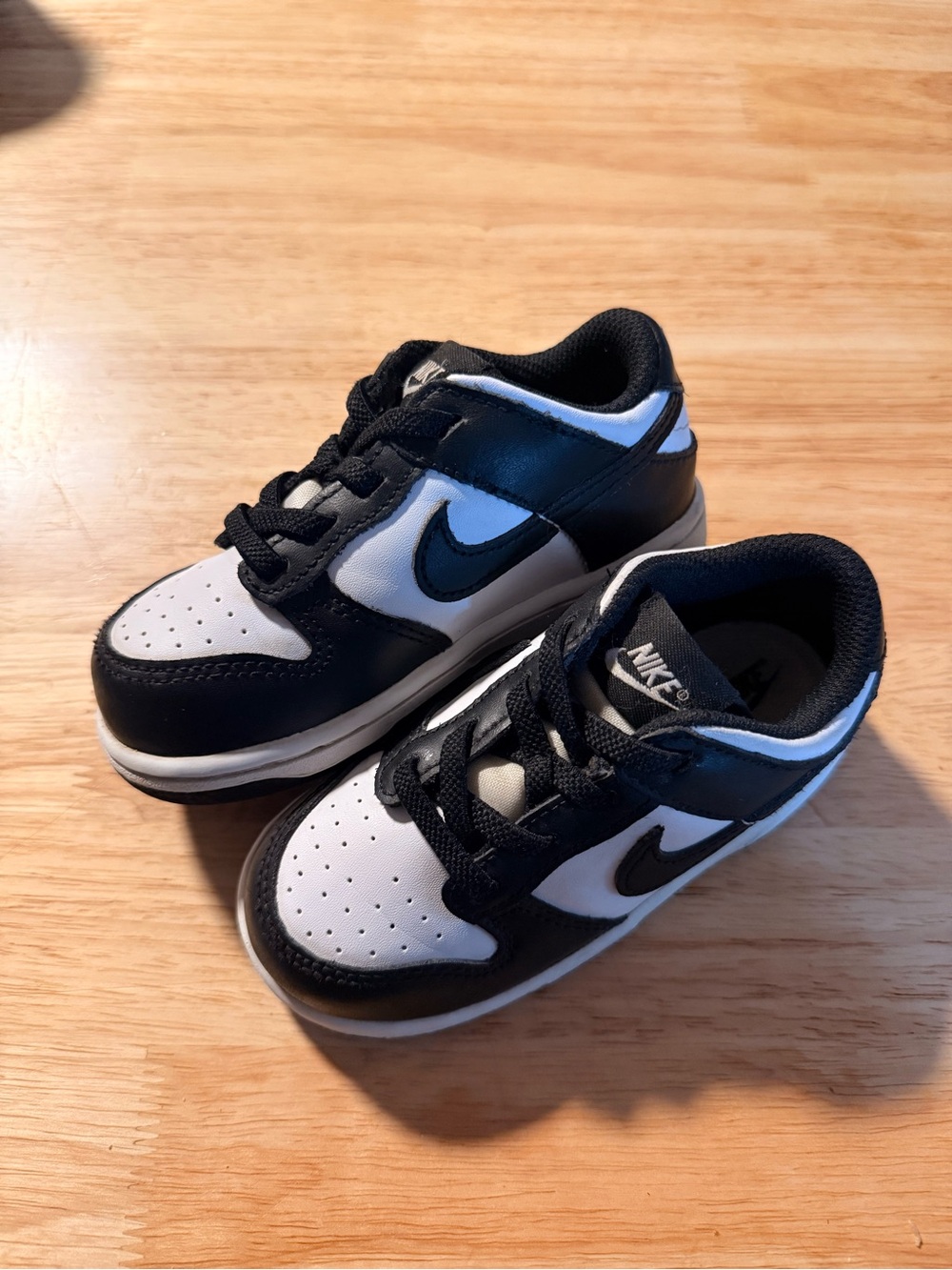 Nike Kids Black and White Low-Top Sneakers with Swoosh